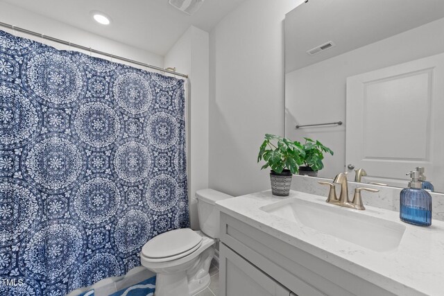 2211 Cherry Top Dr, Fuquay Varina, NC 27526 - bathroom featuring toilet, tile patterned floors, visible vents, and vanity