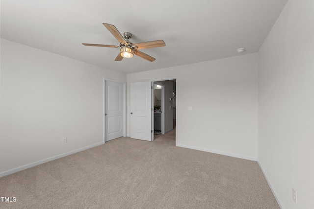 2211 Cherry Top Dr, Fuquay Varina, NC 27526 - unfurnished bedroom featuring a ceiling fan, baseboards, and light colored carpet