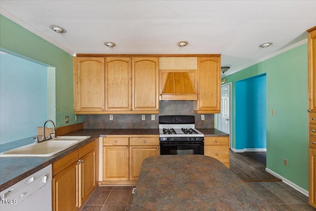 kitchen featuring custom range hood, range with gas stovetop, ornamental molding, dishwasher, and a sink