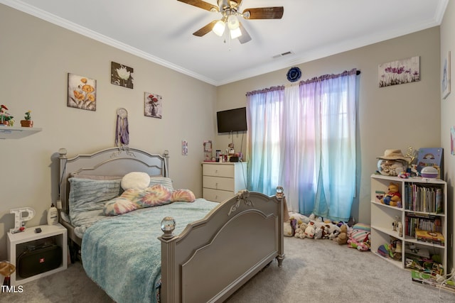 carpeted bedroom featuring crown molding, visible vents, and ceiling fan