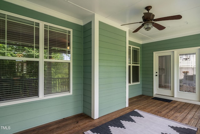 exterior space with a ceiling fan