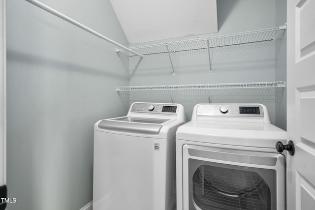 laundry area featuring laundry area and washing machine and dryer