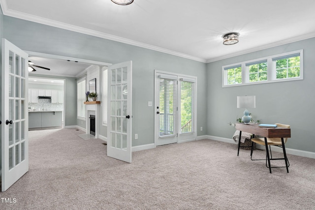 office featuring carpet floors, ornamental molding, and french doors