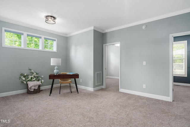 home office with crown molding, carpet flooring, visible vents, and baseboards