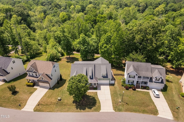 bird's eye view with a residential view and a view of trees