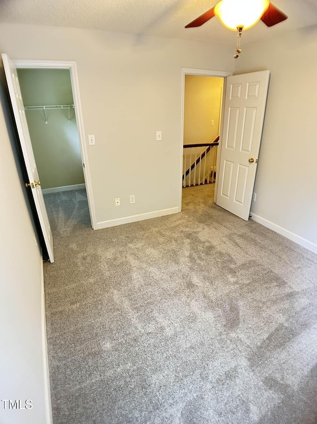 109 Elmview Dr, Cary, NC 27519 - carpeted spare room with a ceiling fan and baseboards