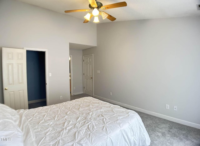 109 Elmview Dr, Cary, NC 27519 - bedroom featuring carpet floors, baseboards, vaulted ceiling, and a ceiling fan