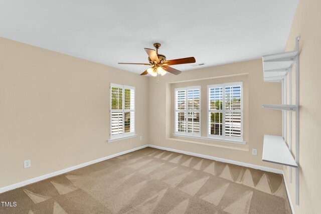 105 Ryder Cup Cir, Raleigh, NC 27603 - carpeted empty room with a ceiling fan and baseboards