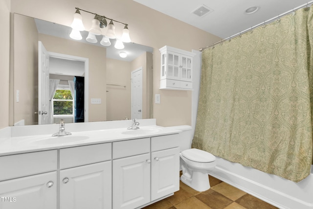 105 Ryder Cup Cir, Raleigh, NC 27603 - full bathroom with double vanity, toilet, and shower / bath combo