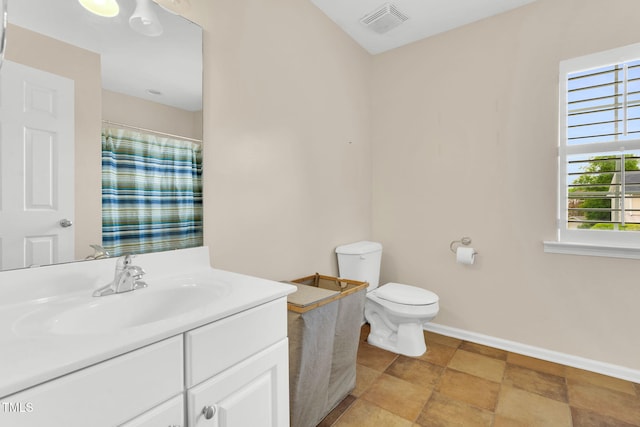 105 Ryder Cup Cir, Raleigh, NC 27603 - full bath with baseboards, toilet, vanity, and a shower with curtain