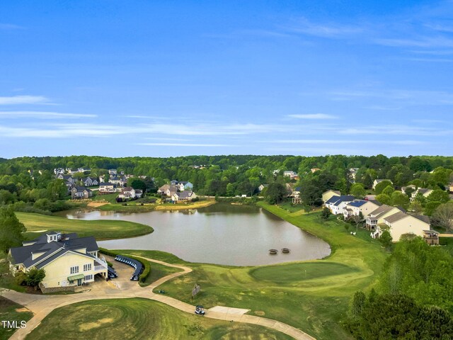 105 Ryder Cup Cir, Raleigh, NC 27603 - aerial perspective of suburban area with a nearby body of water, a local golf course, and a tree filled landscape
