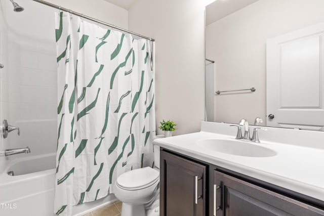 full bathroom with vanity, toilet, tile patterned floors, and shower / tub combo with curtain