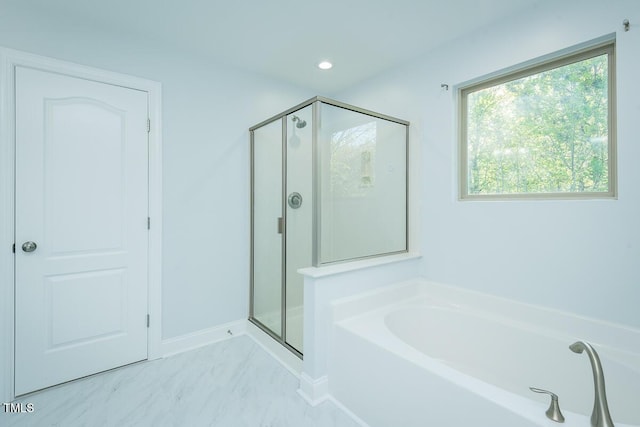 bathroom with recessed lighting, marble finish floor, baseboards, a garden tub, and a stall shower