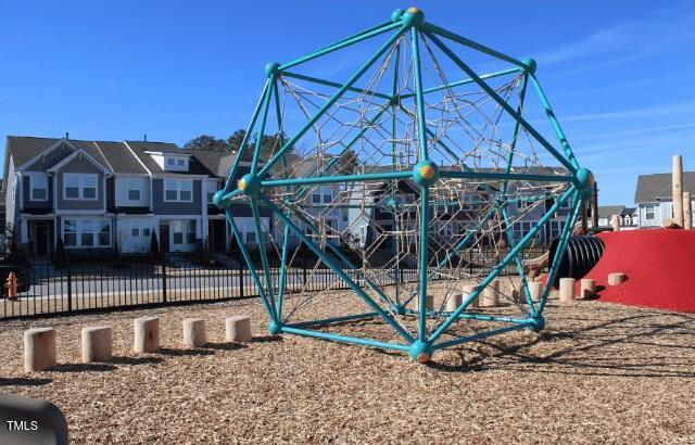 community play area with fence