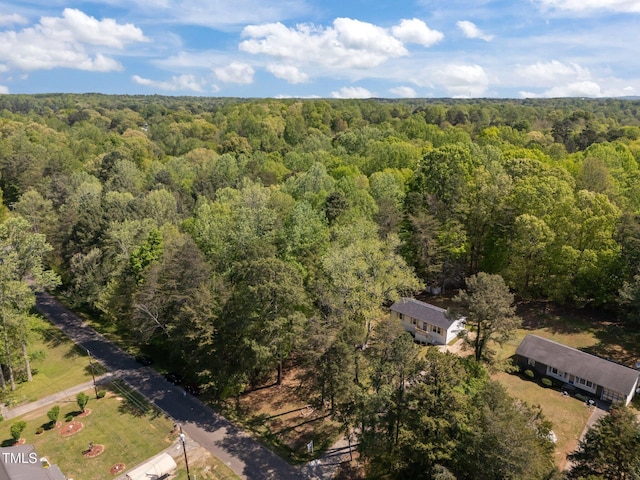 aerial view with a wooded view