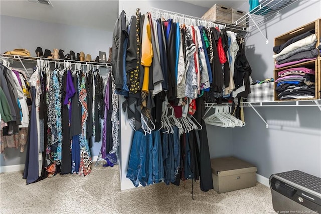 spacious closet featuring carpet floors and visible vents