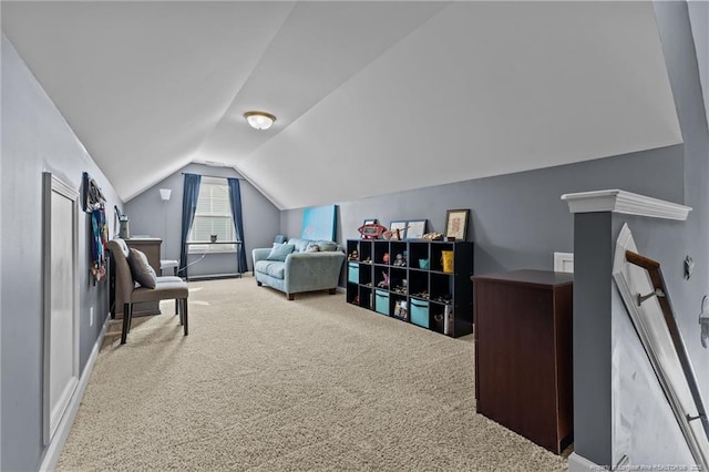 bedroom featuring baseboards, carpet, and vaulted ceiling