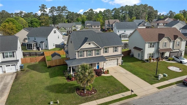 drone / aerial view with a residential view