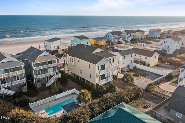 aerial view with a beach view and a water view