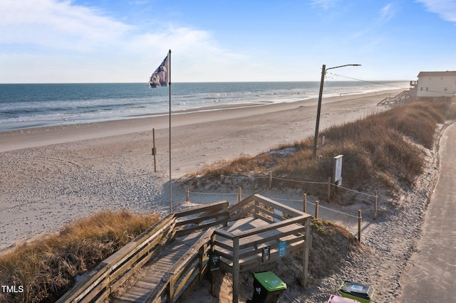 view of water feature with a beach view