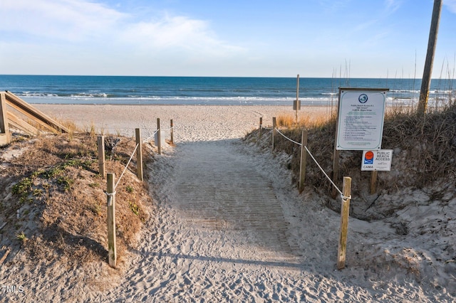 view of water feature with a beach view
