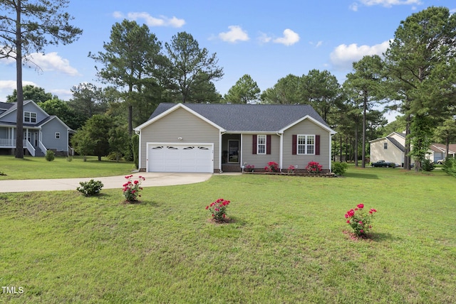 ranch-style house featuring concrete driveway, an attached garage, and a front yard