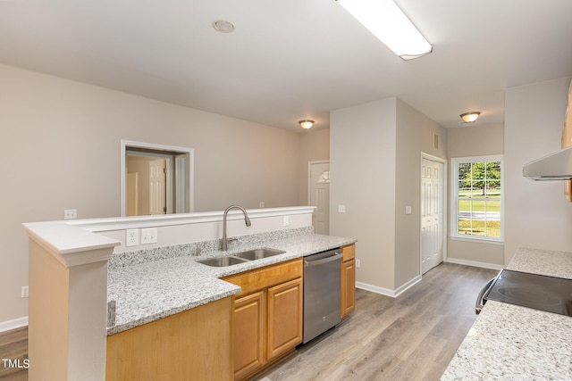 411B Aversboro Rd, Garner, NC 27529 - kitchen featuring light wood-style floors, dishwasher, baseboards, and a sink
