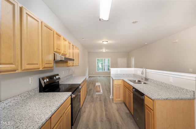 411B Aversboro Rd, Garner, NC 27529 - kitchen with range with electric stovetop, a sink, stainless steel dishwasher, under cabinet range hood, and light wood-style flooring