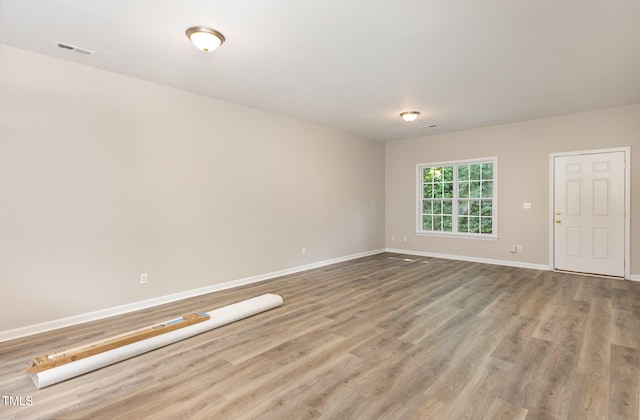 411B Aversboro Rd, Garner, NC 27529 - spare room with visible vents, baseboards, and wood finished floors