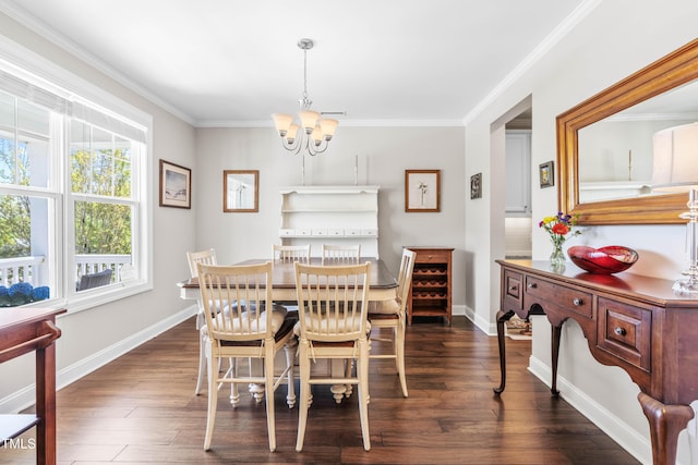 240 Liberty Star Rd, Wendell, NC 27591 - dining room featuring a chandelier, ornamental molding, dark wood-style floors, and baseboards