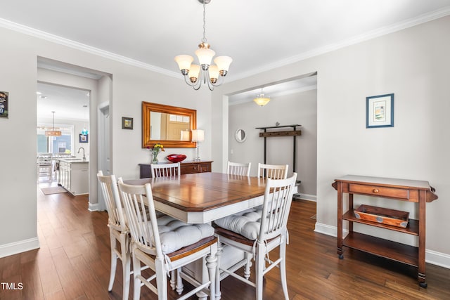 240 Liberty Star Rd, Wendell, NC 27591 - dining room with a chandelier, dark wood-style floors, crown molding, and baseboards