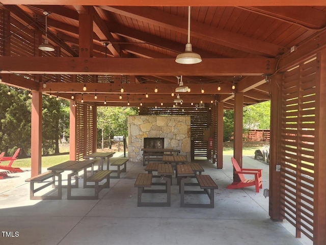 240 Liberty Star Rd, Wendell, NC 27591 - view of patio featuring an outdoor stone fireplace and a gazebo