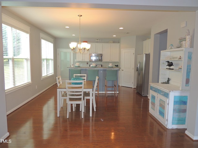 3530 Winding Walk Ct, Raleigh, NC 27616 - dining room featuring a chandelier, dark wood-style flooring, baseboards, and recessed lighting