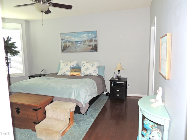 3530 Winding Walk Ct, Raleigh, NC 27616 - bedroom with wood finished floors, multiple windows, a ceiling fan, and baseboards