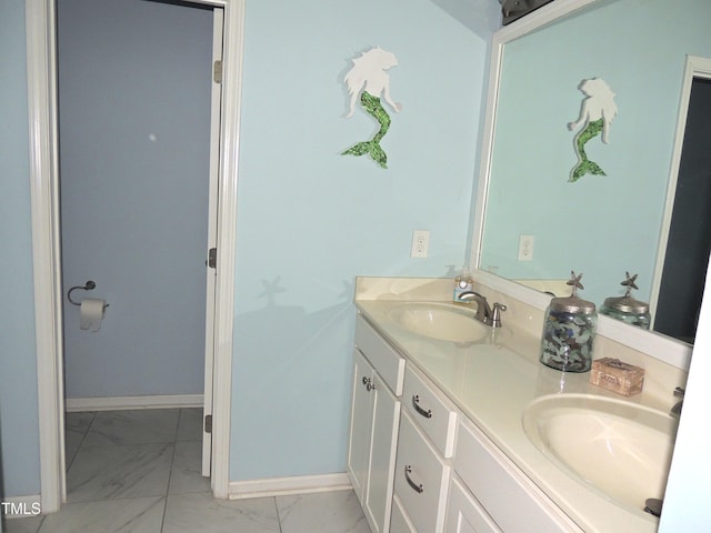 3530 Winding Walk Ct, Raleigh, NC 27616 - full bathroom featuring marble look tile flooring, double vanity, and baseboards