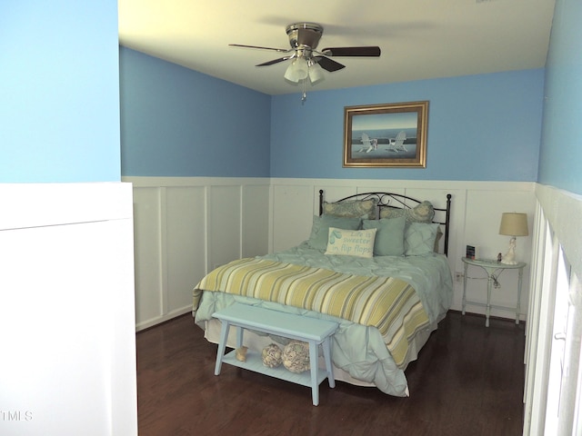 3530 Winding Walk Ct, Raleigh, NC 27616 - bedroom featuring wainscoting, wood finished floors, a decorative wall, and ceiling fan