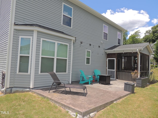 3530 Winding Walk Ct, Raleigh, NC 27616 - rear view of house featuring a sunroom, a patio area, and a yard
