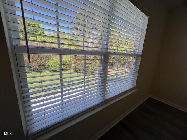 8013 River Water Ct, Raleigh, NC 27616 - details featuring wood finished floors and baseboards