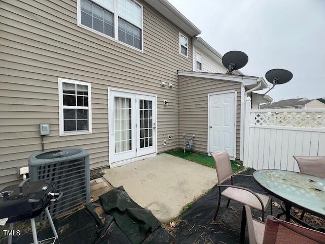 8013 River Water Ct, Raleigh, NC 27616 - view of patio / terrace with cooling unit and fence