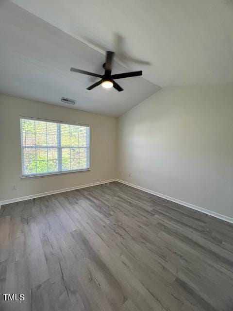 8013 River Water Ct, Raleigh, NC 27616 - unfurnished room with ceiling fan, lofted ceiling, baseboards, and dark wood-style floors