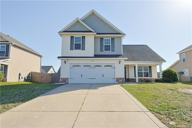 craftsman house with board and batten siding, concrete driveway, stone siding, and a front lawn