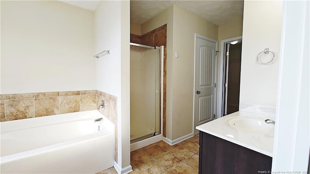 1221 Piping Plover Ct, Fayetteville, NC 28306 - full bathroom featuring a bath, a stall shower, and double vanity