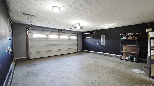 1221 Piping Plover Ct, Fayetteville, NC 28306 - garage with baseboards and a garage door opener