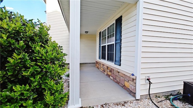 1221 Piping Plover Ct, Fayetteville, NC 28306 - view of exterior entry featuring covered porch