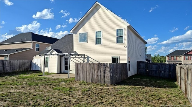 1221 Piping Plover Ct, Fayetteville, NC 28306 - rear view of house featuring a patio