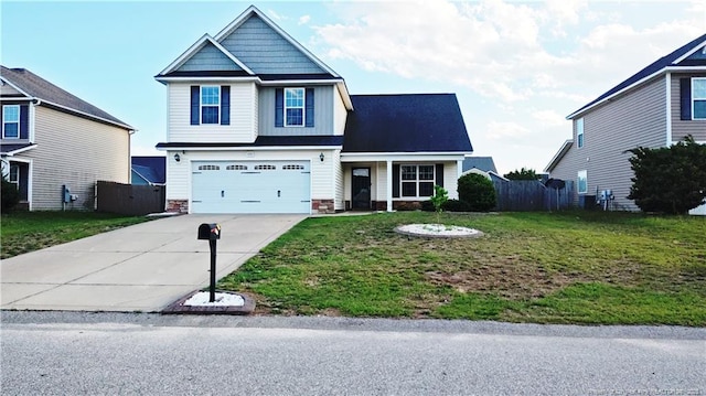 1221 Piping Plover Ct, Fayetteville, NC 28306 - view of front facade featuring driveway and an attached garage