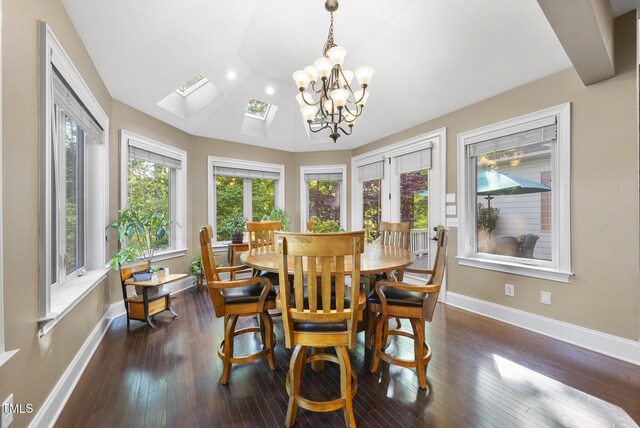 dining space featuring recessed lighting, baseboards, dark wood finished floors, and lofted ceiling with skylight
