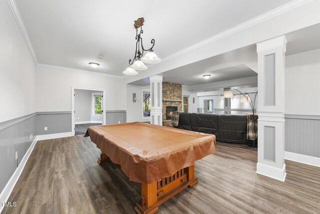 playroom with a wainscoted wall, billiards, decorative columns, and wood finished floors