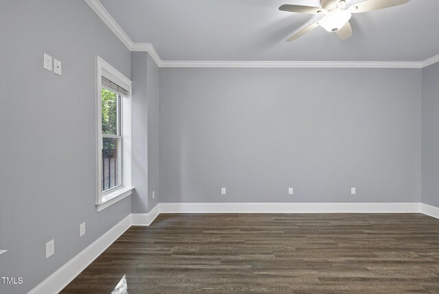 unfurnished room featuring crown molding, baseboards, a ceiling fan, and dark wood finished floors