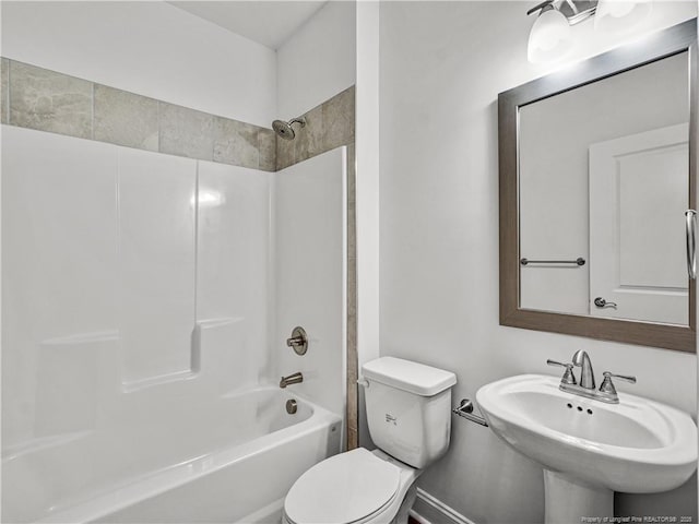 114 Kingwood Dr, Lillington, NC 27546 - full bathroom featuring baseboards, bathtub / shower combination, a sink, and toilet